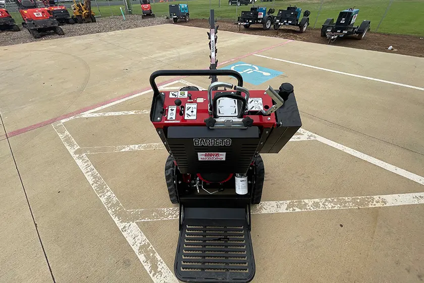 Red Barreto trencher displaying operation controls