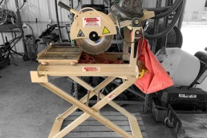 Echo brick and block wet saw mounted on a folding stand in a workshop setting