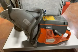 Husqvarna gas-powered cut-off saw on display, ideal for cutting concrete and metal